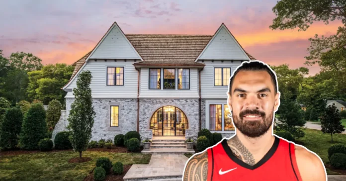 Front view of Steven Adams House showcasing modern architecture and lush landscaping, reflecting the NBA star’s private and elegant lifestyle.