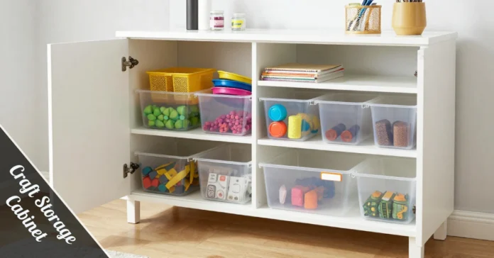 Organized craft storage cabinet with open doors showing colorful supplies in clear bins and adjustable drawer shelves